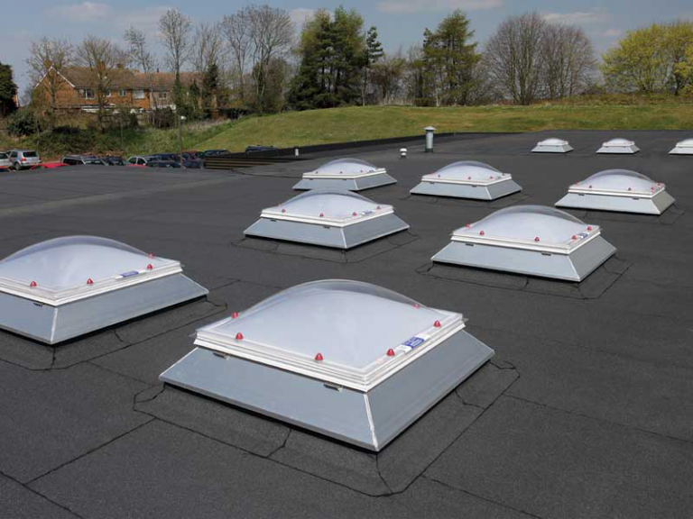 Roof domes installed on commercial flat roof