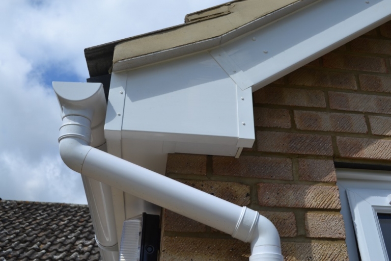 New gutters and downpipes by UK installers