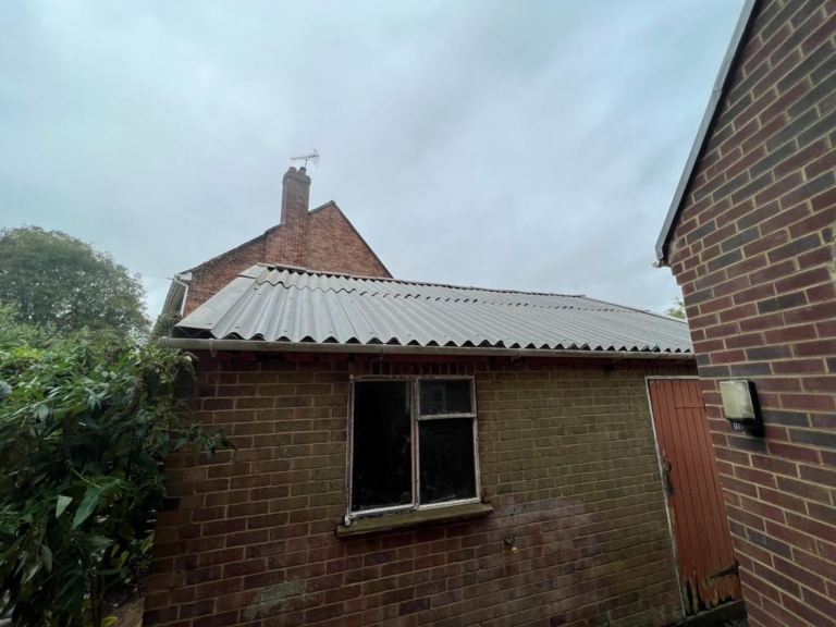 Asbestos garage roof sheets removed and new installed