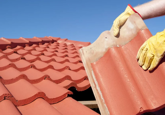 A tile being replaced on a Norwich roof